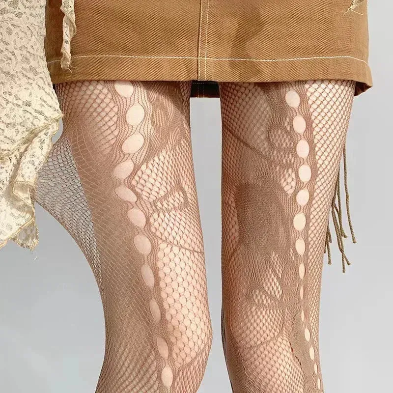 Ripped Y2K spider web fishnets