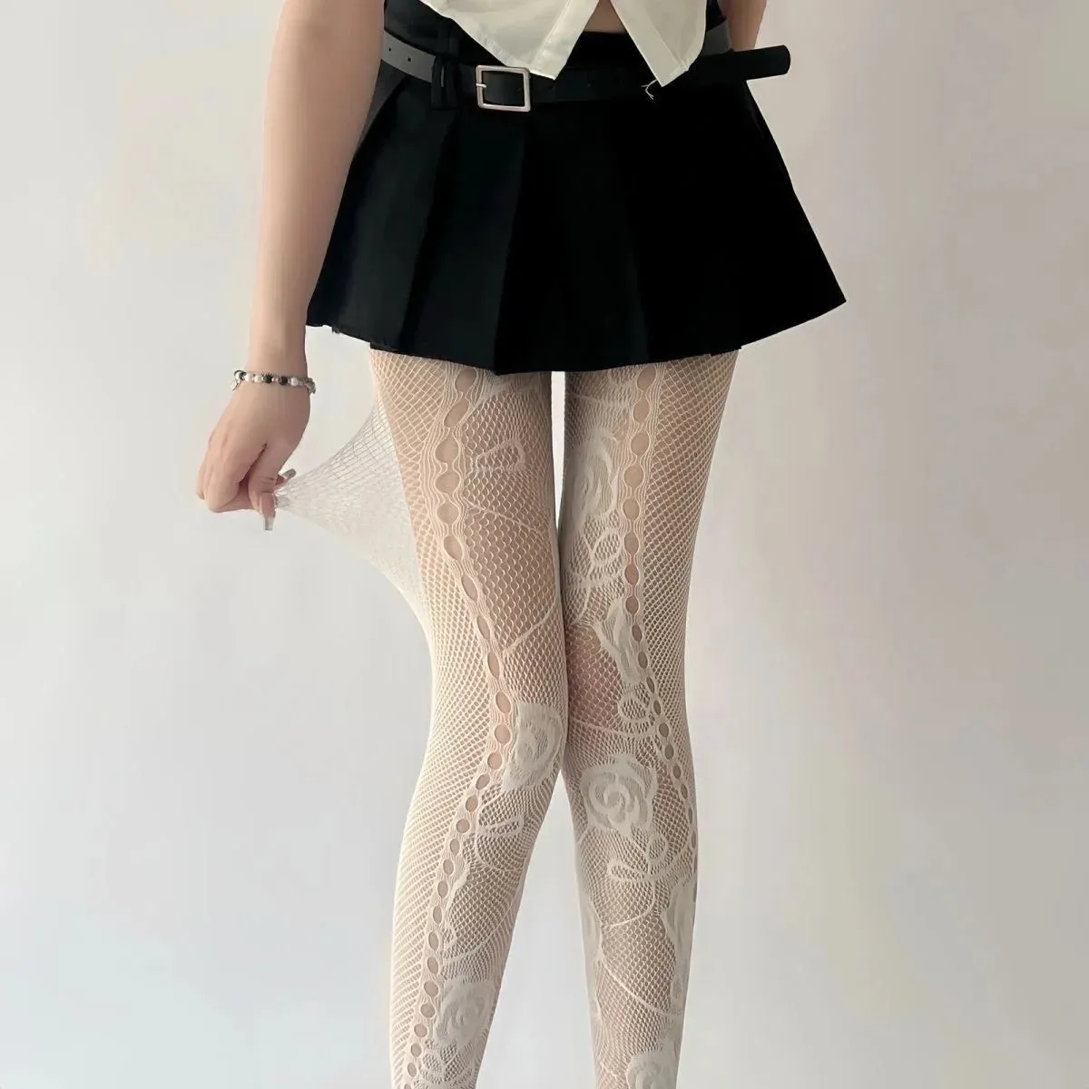 Ripped Y2K spider web fishnets